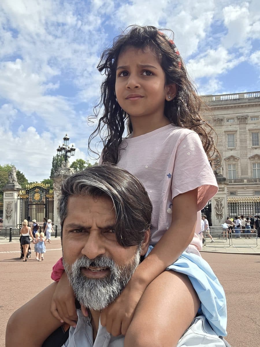 Fayaz Jaffer with his daughter on his shoulders in London