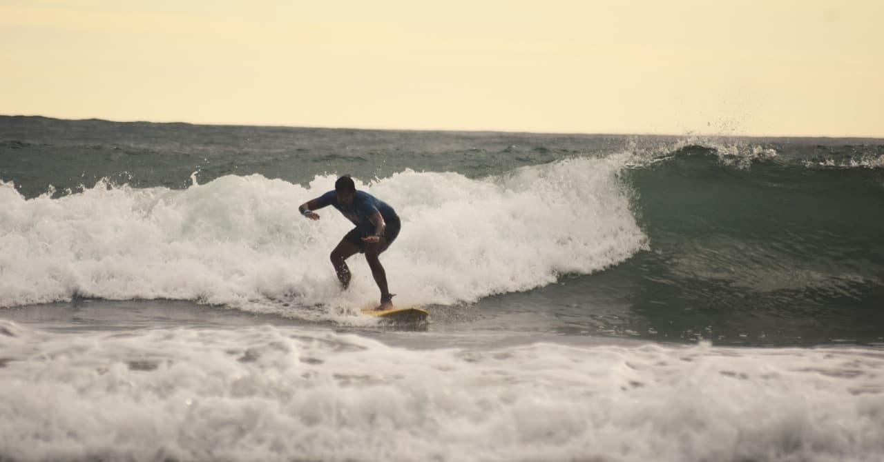 Riding a wave at Santa Teresa, December 2024